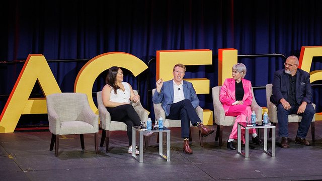Tim Barrett speaking on a panel at an ACEL event